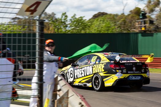 MELBOURNE/AUSTRALIA - SEPTEMBER 17, 2016: Supercars in qualifying session for the Sandown 500 'Retro' Endurance race at Sandown raceway.