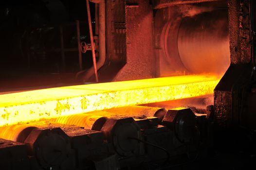 hot steel plate on conveyor in steel plant