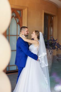 Newlyweds on a walk in a summer day wedding