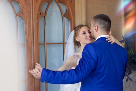 Newlyweds on a walk in a summer day wedding