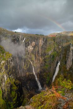 Rainbow over the famous Voringsfossen waterfalls near Hardangervidda, Norway