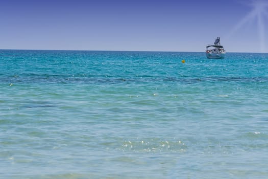 Beautiful seascape with yacht on the blue sea. Place Photo with Copy Space.