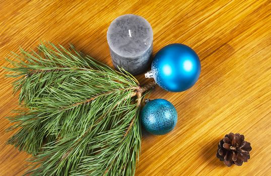 New Year 2017 decoration with blue balls and candle on wooden background 