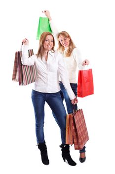 Two beautiful young women with shopping bags