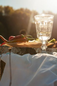 Russian vodka in small glass with snacks at outdoors