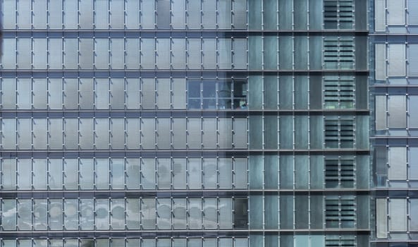 Flat view of the face of a building with large glass windows