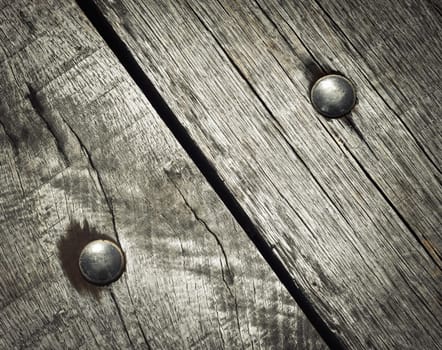 abstract background detail riveted on wooden boards