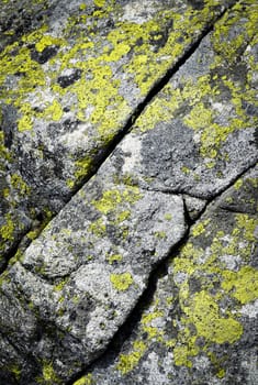 background or texture granite stone block with slanting fissures