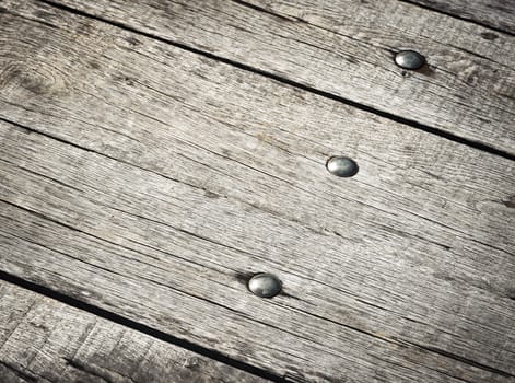 abstract background detail riveted on wooden boards