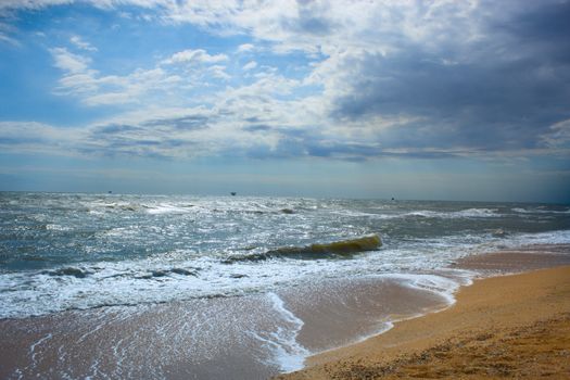 beach and waves of the sea, storm clouds