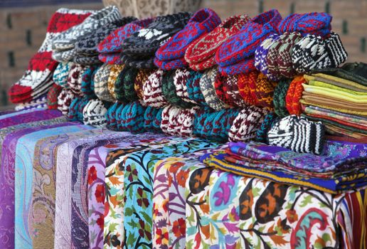 Street market with scarves and knitted slippers, Khiva, Uzbekistan