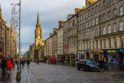 EDINBURGH, SCOTLAND - CIRCA NOVEMBER 2012: The Royal Mile at sunset and Tron Kirk former church.