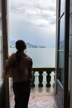 woman looking over Lake Maggiore and the Borromean Islands