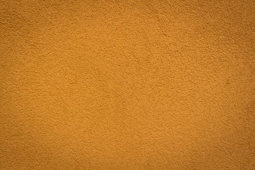 wall color bronze background and texture with vignetting and blank copyspace for text or advertising.