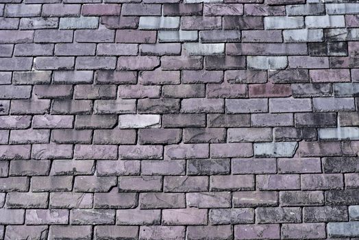 The house roof made from stone tiles