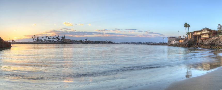 Sunset over the harbor in Corona del Mar, California at the beach in the United States