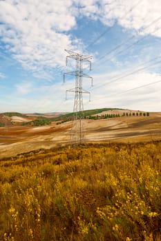 Power Line on the Plowed Field in Spain