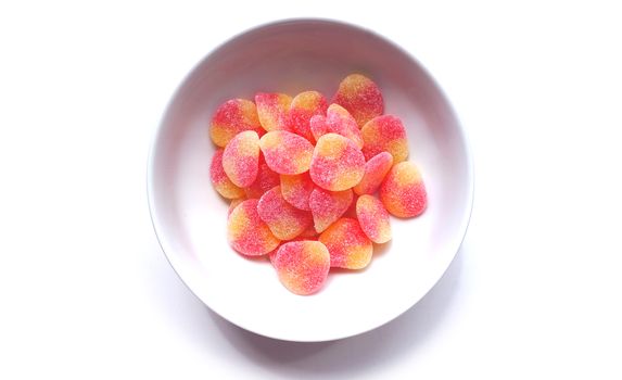 jelly with sugar in the white bowl Top view on white background