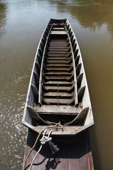 old wooden row boat on river