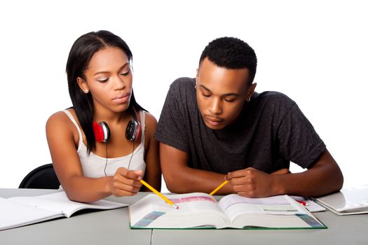 Two students studying together from text book, lifestyle tutoring concept, on white.