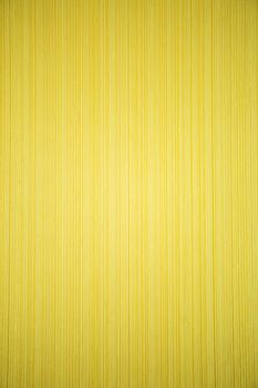 yellow striped textured wallpaper