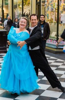 MELBOURNE, AUSTRALIA - SEPTEMBER 25: A couple ball room dancing in Melbourne's world famous Block Arcade on September 25, 2016.