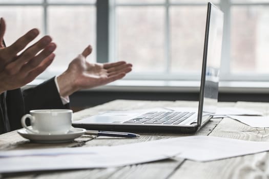 Business man working with laptop computer and financial documents in office