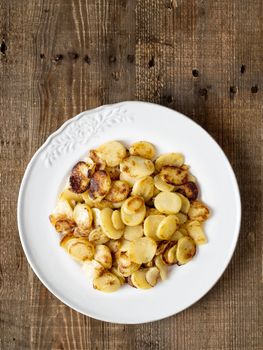 close up of rustic german bratkartofflen fried potatoes