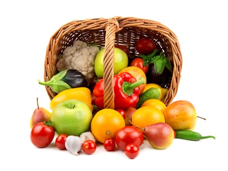 fruits and vegetables in a basket isolated on white background