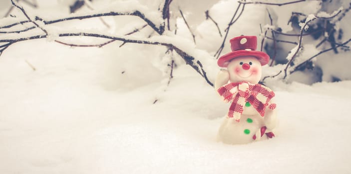 Merry Christmas! Winter Christmas Background With Festive Snowman Wearing A Red Hat, Winter Landscape, Nature Background, Snowy forest, Christmas And New Year Greeting Cards, Perfect Winter Greetings