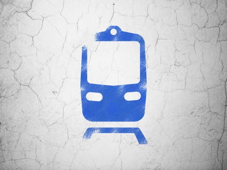 Vacation concept: Blue Train on textured concrete wall background