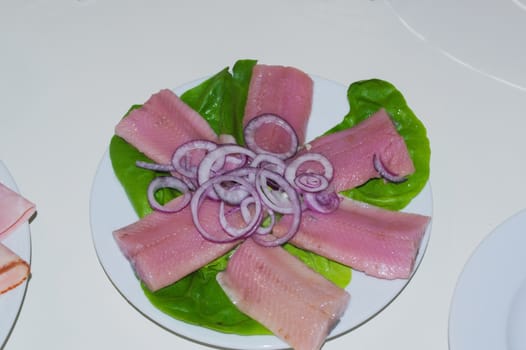 smoked salmon with green salad on a plate