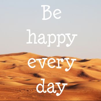 Blured desert with text: Be happy