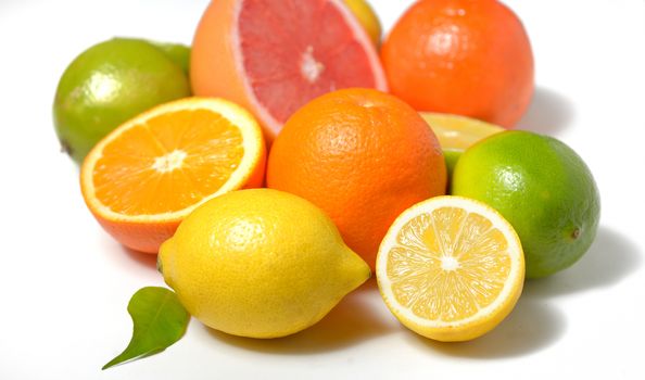 citrus fruit with leaves on white background


