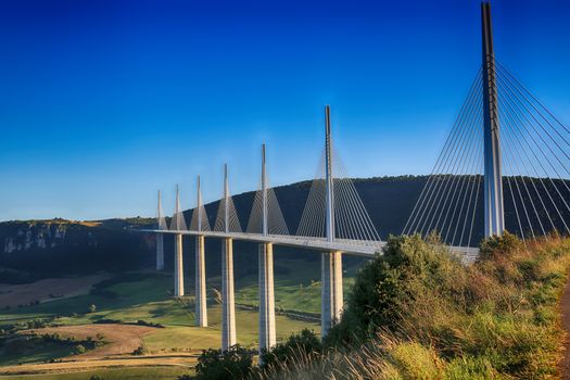 Millau, France - August 21, 2016: The Millau Viaduct Is The Tallest Bridge In The World with One Mast's Summit At 343 Metres Above The Base Of The Structure. Aveyron, Midi Pyrenees, France