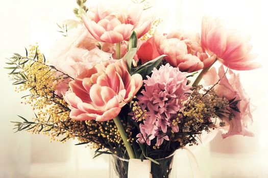 Bouquet of different flowers including tulips and mimosa