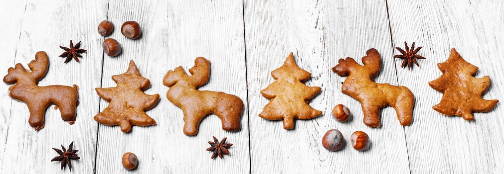 Christmas cookies in the shape of Christmas tree and a reindeer
