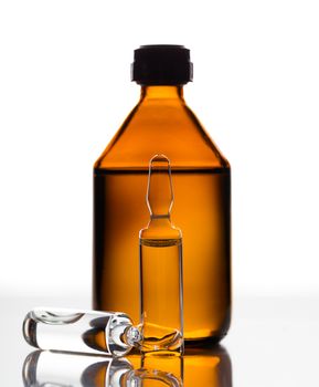 medicament in a glass vial on white background
