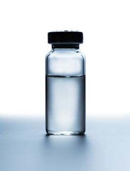 medicament in a glass vial on white background