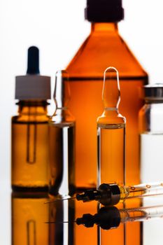 medicament in a glass vial and syringe closeup