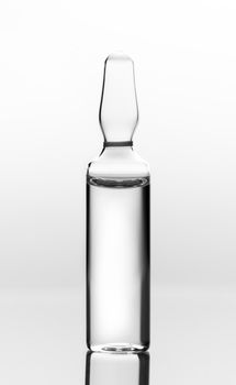 medicament in a glass vial on white background