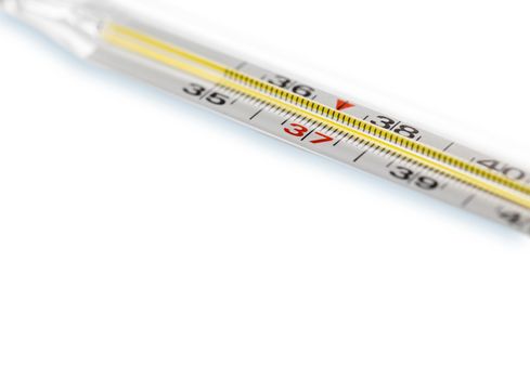 Scale of thermometer closeup on a white background