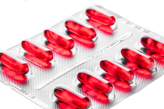 pills in packing closeup on a white background