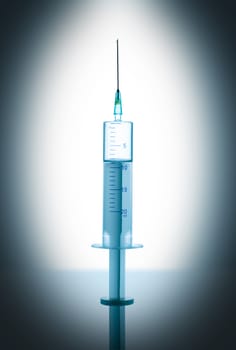 with the reflection of closeup a medical syringe