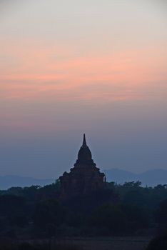 afternoon sunset with pagodas in bagan, myanmar
