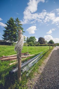 Garden lawn with a fence made by a rope