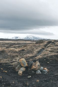 Cloudy weather over a rocky landscape in Iceland