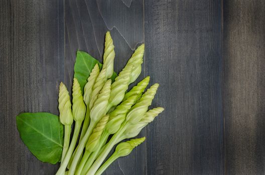 top view of Moonflower (Ipomoea alba L.) on wooden background