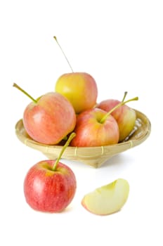 Red and yellow apple  with bamboo basket , organic fresh fruit.