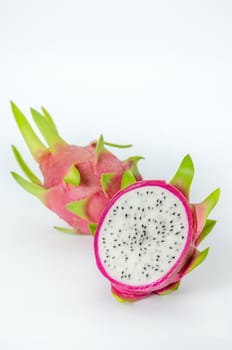 Ripe Dragon fruit or Pitaya with slice on white background